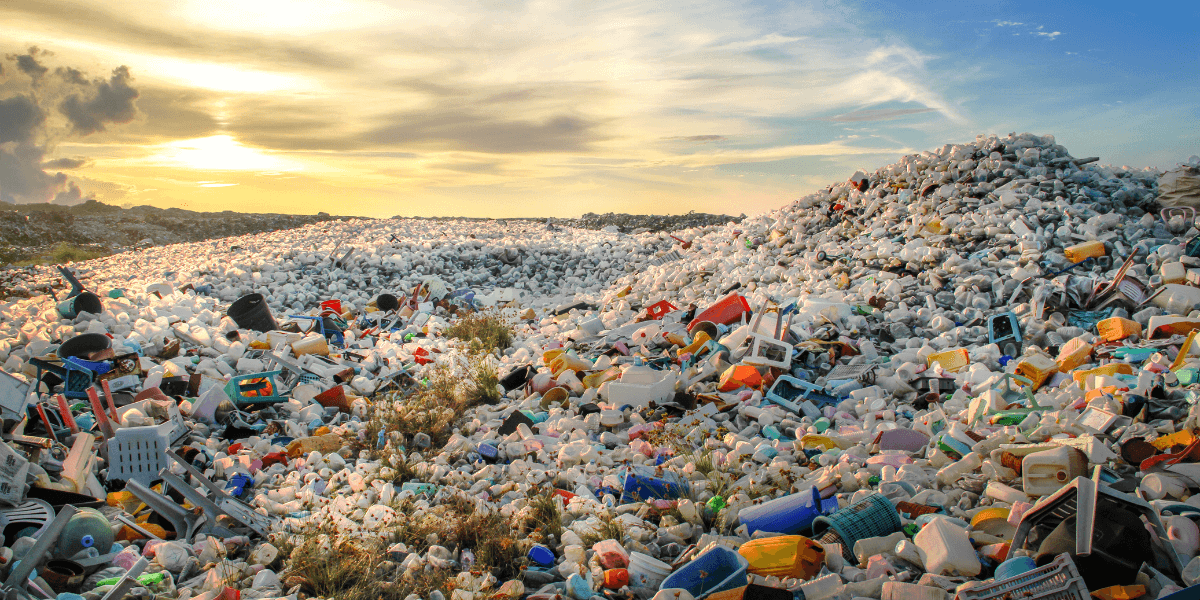 Sun setting on a landfill full of recyclables. 