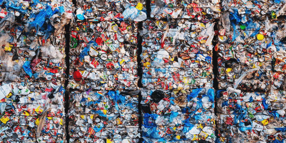 Stacks of baled aluminum cans.