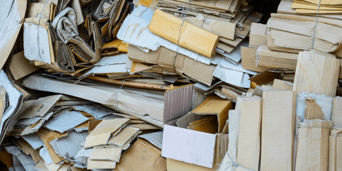 Cardboard and paper recyclables grouped together. 